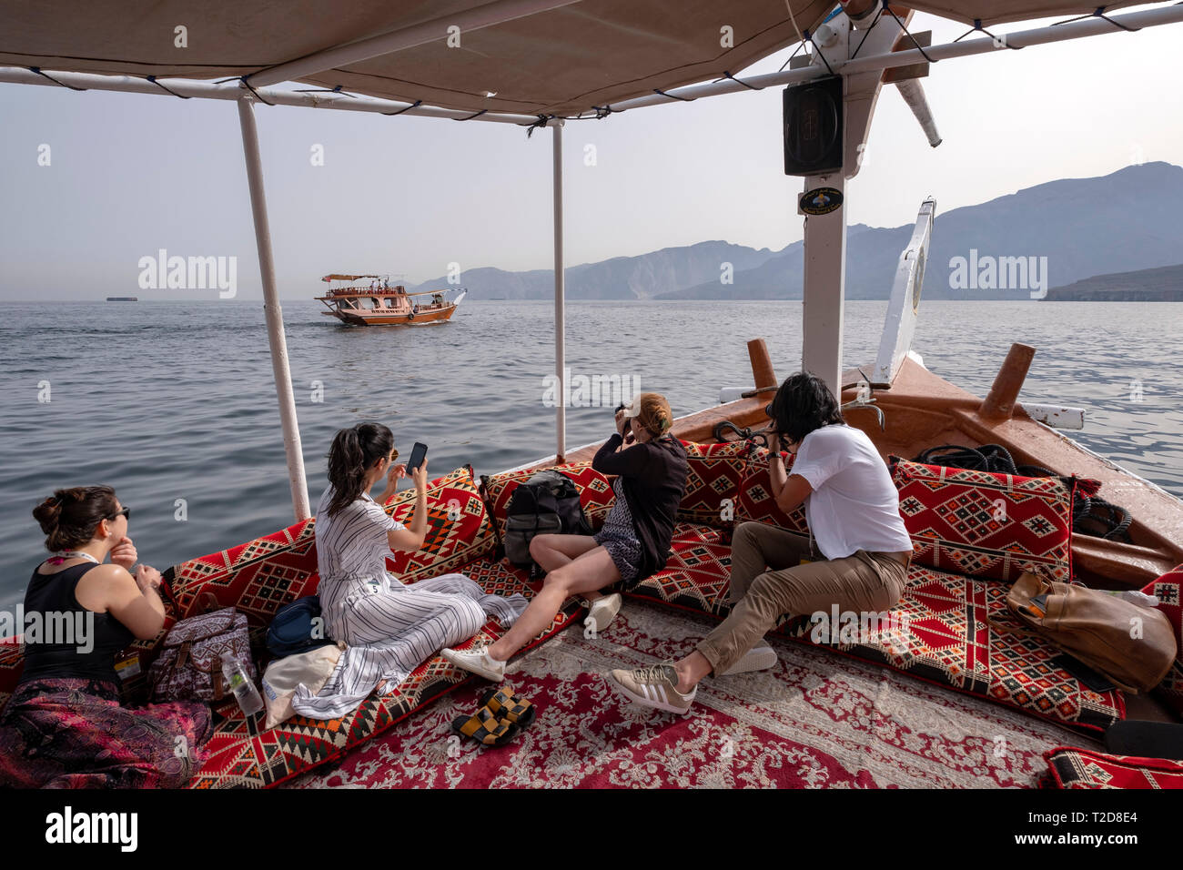 Cruise tour aboard a traditionally decorated arabian Dhow wooden boat