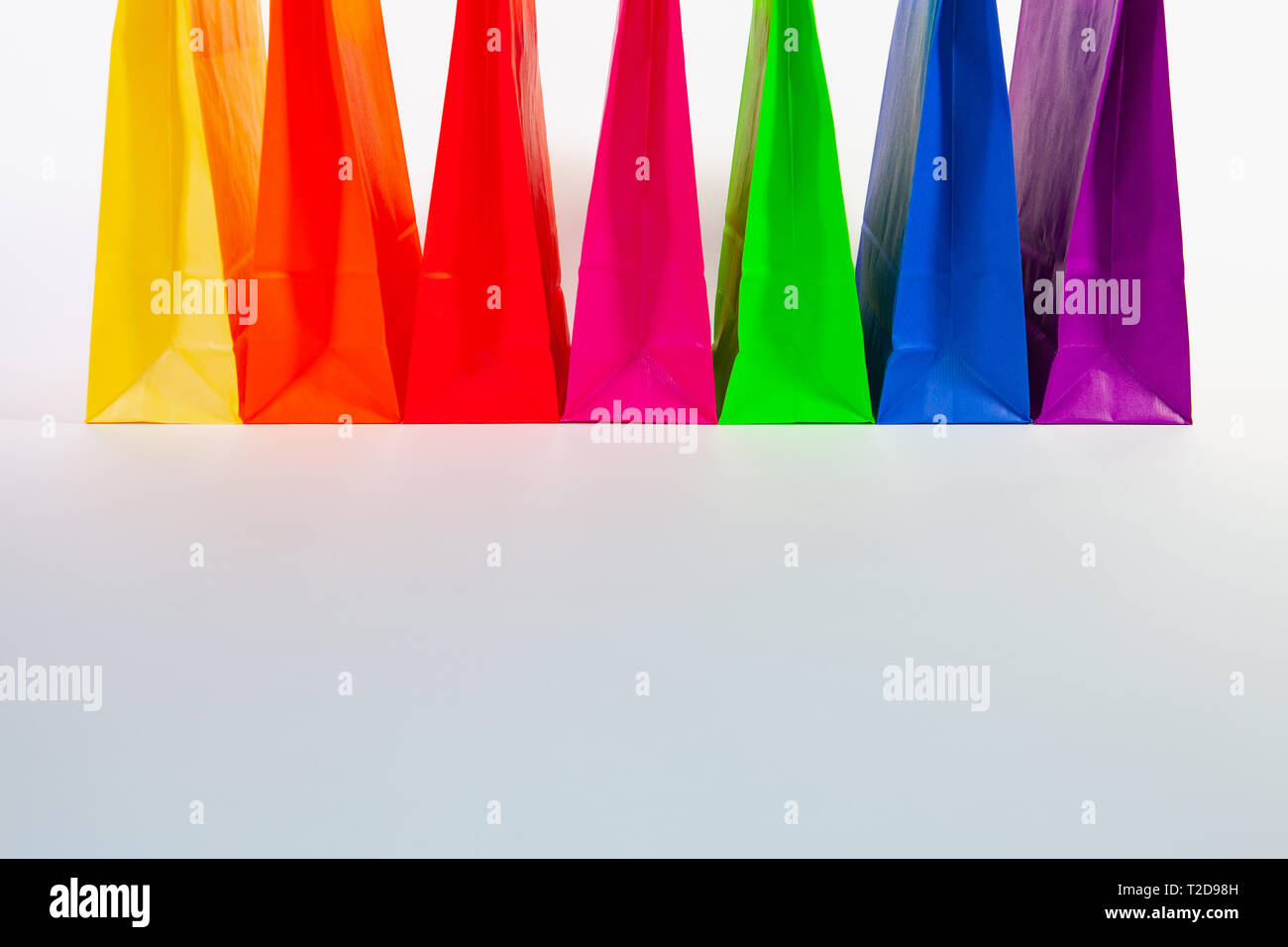 Set of colorful empty shopping bags isolated on the white background ...