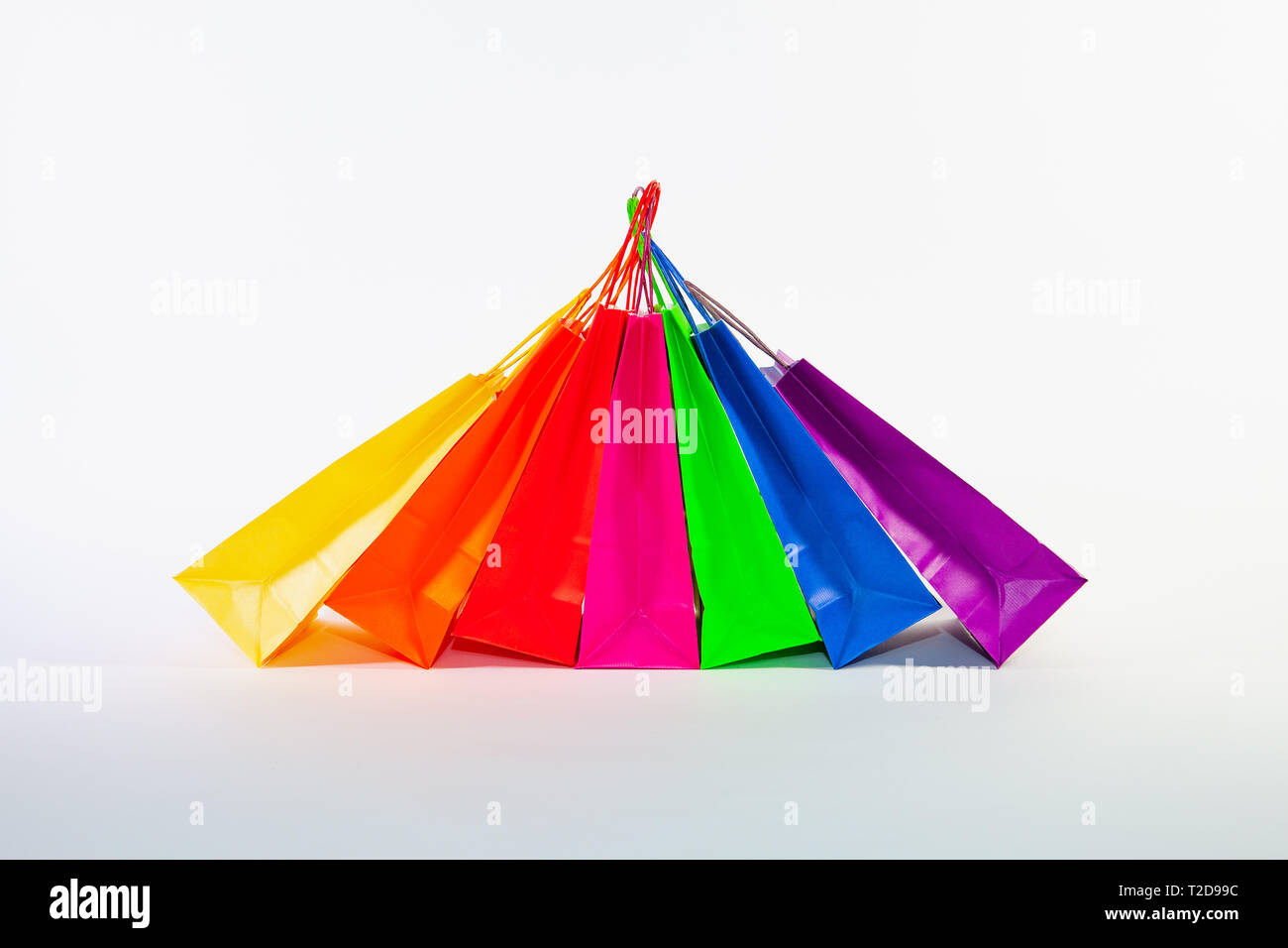 Set of colorful empty shopping bags isolated on the white background ...