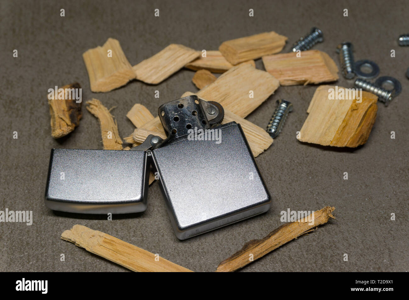Zippo with wooden chips Stock Photo