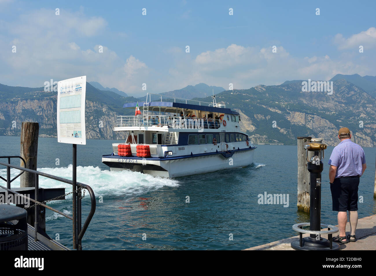 Passenger ship on the Lake Garda in front of Malcesine - Italy. Stock Photo