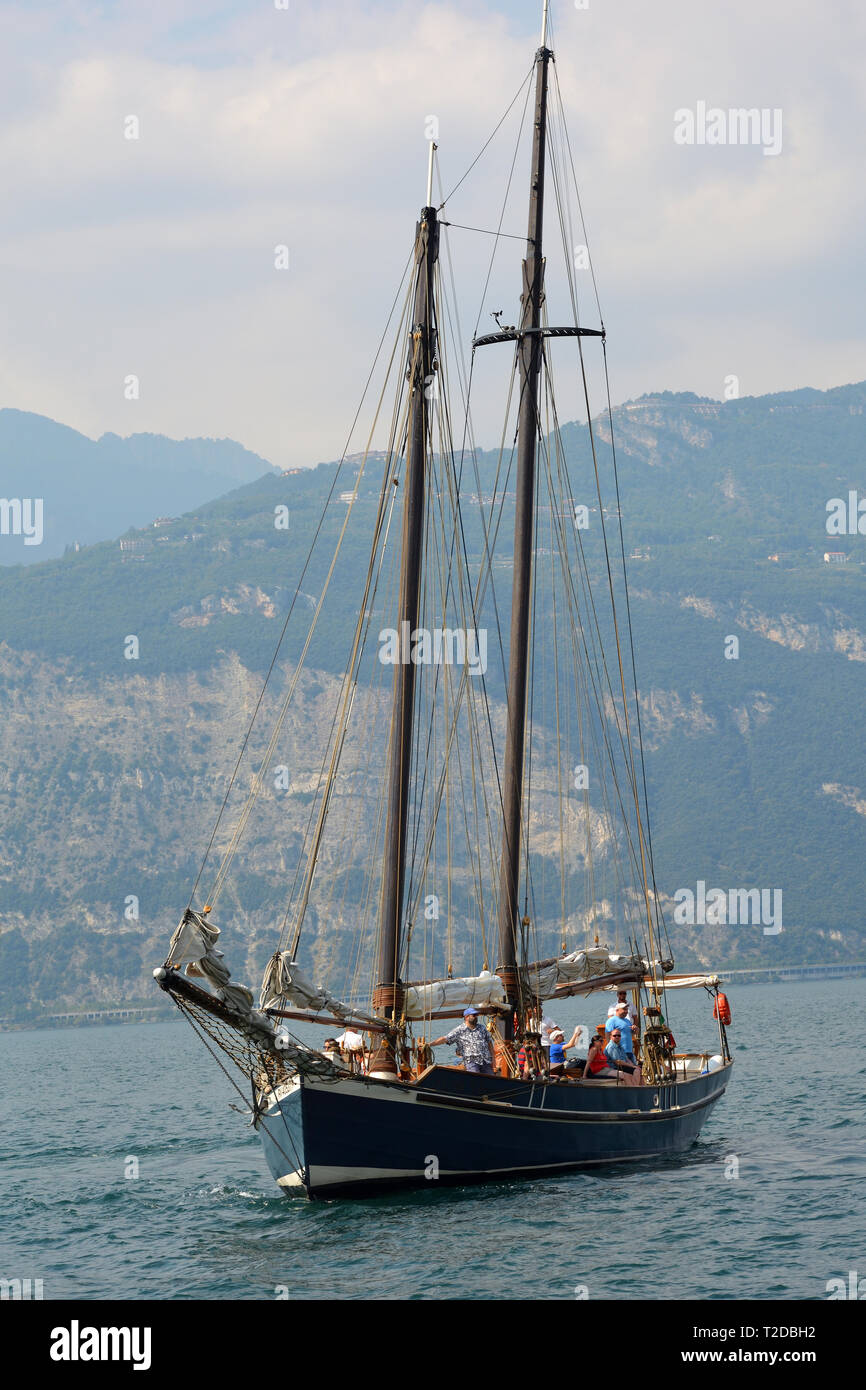 Sailboat on the Lake Garda near by Malcesine - Italy. Stock Photo