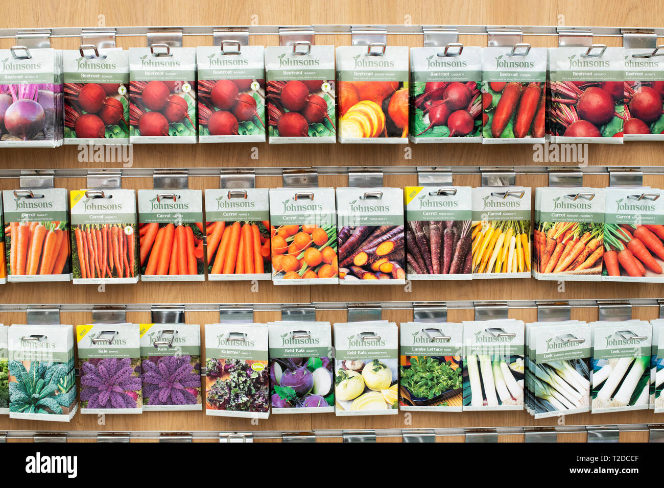 Vegetable seed packets for sale in a garden centre. UK Stock Photo