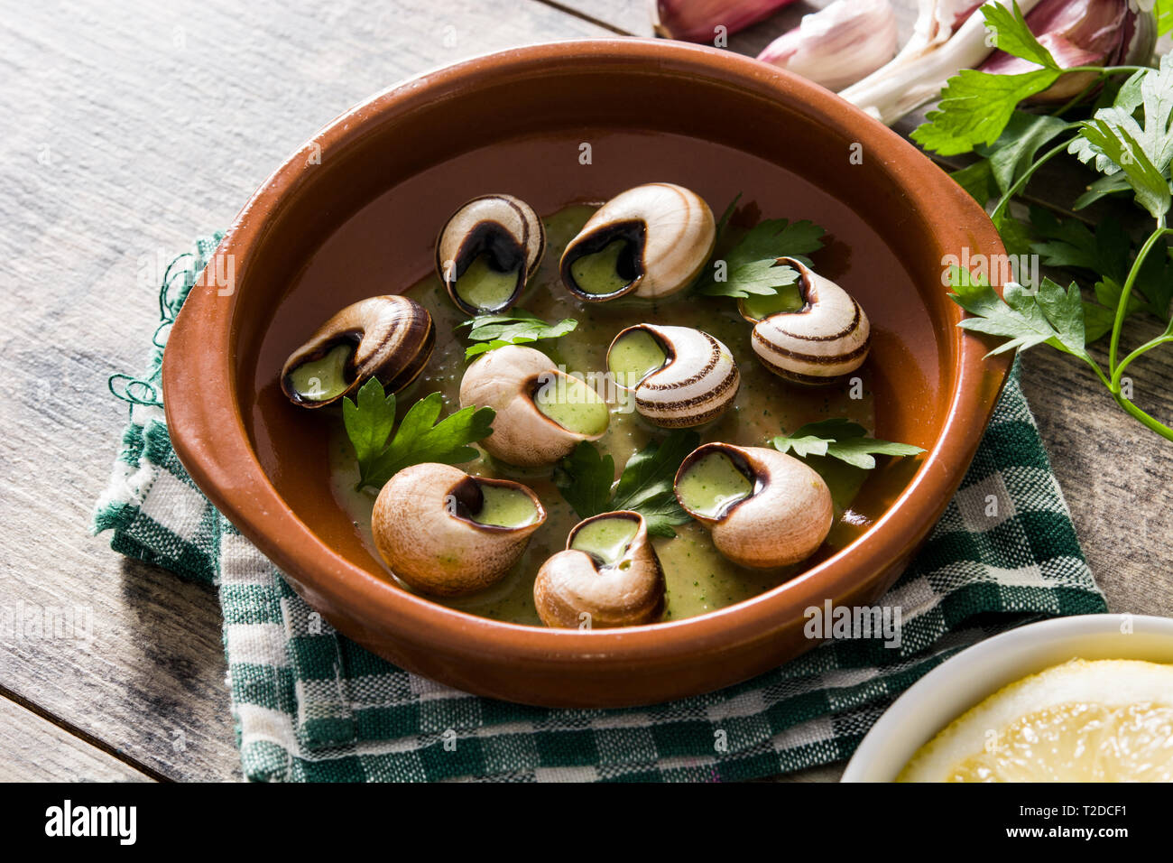 Escargots de Bourgogne. Snails with herbs and garlic butter Stock Photo
