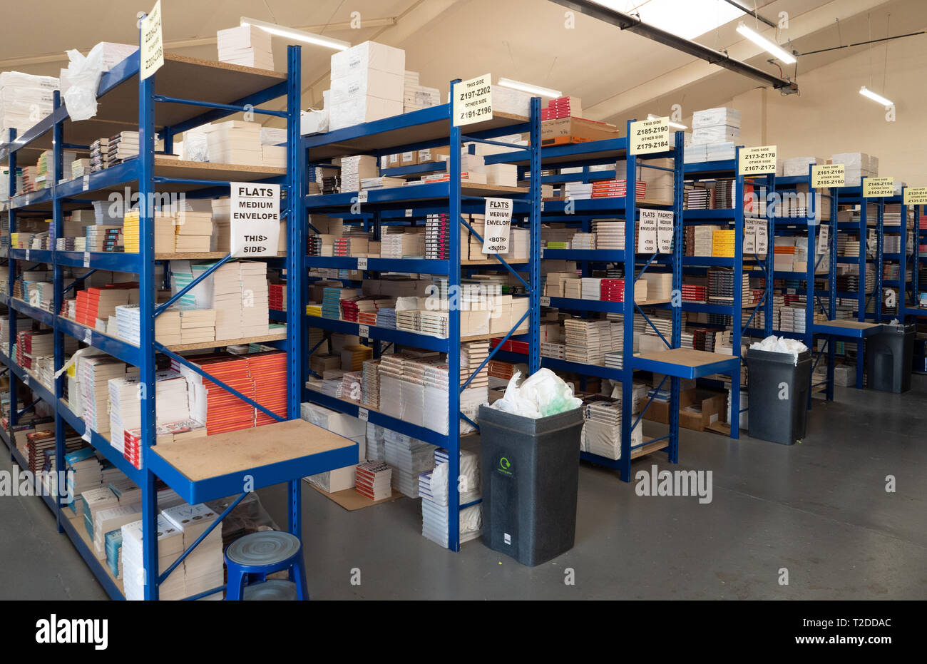 Shelves in warehouse stacked with books awaiting sale and dispatch through an online marketing site, 'A Great Read'. Based in Westbury, Wiltshire, UK. Stock Photo