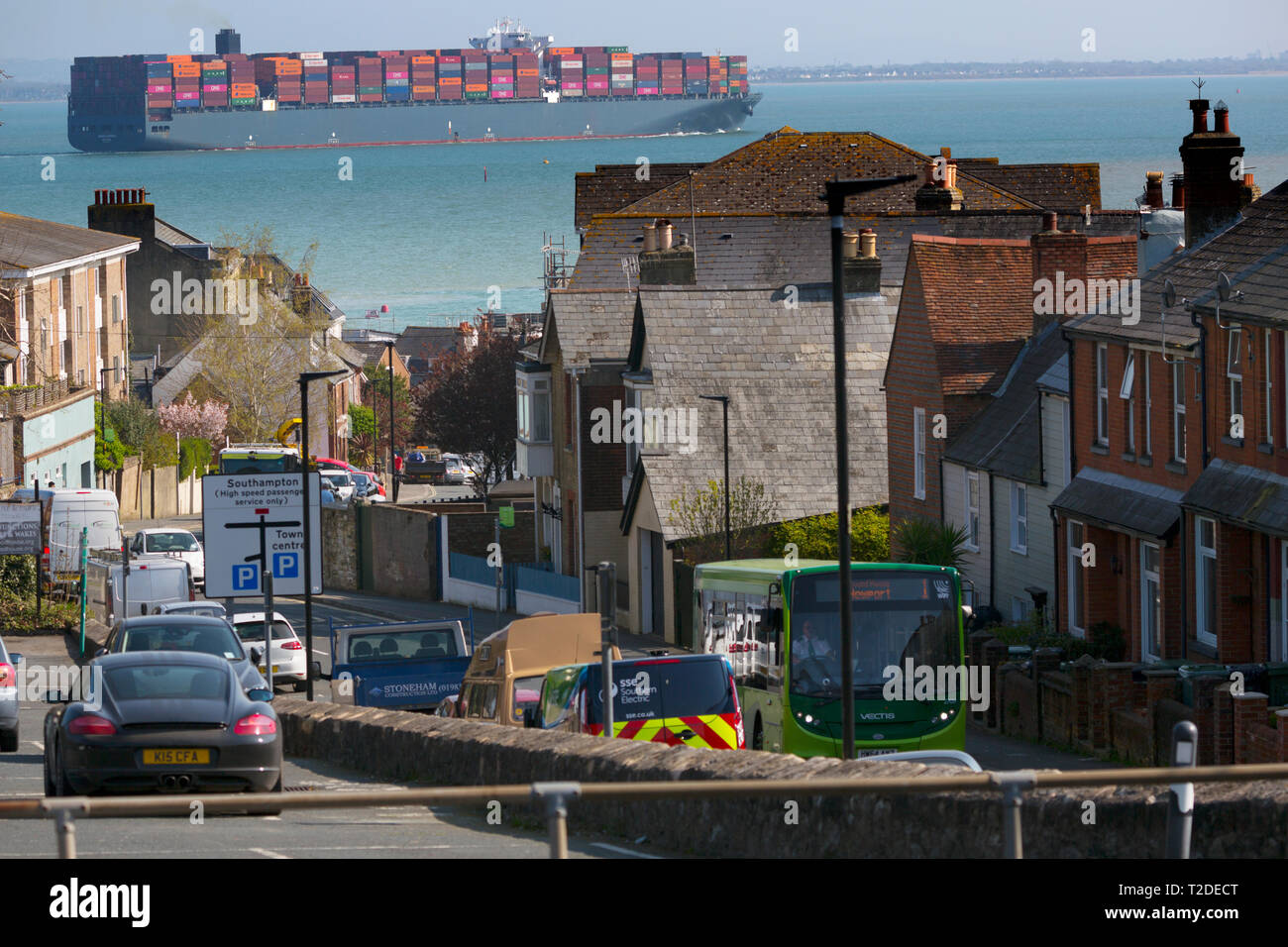 Container,Ship,Madrid,Express,Southampton,Port,Harbour,Escourt,Launch,services,Master,departure,water,The Solent,Cowes,Isle of Wight,UK, Stock Photo