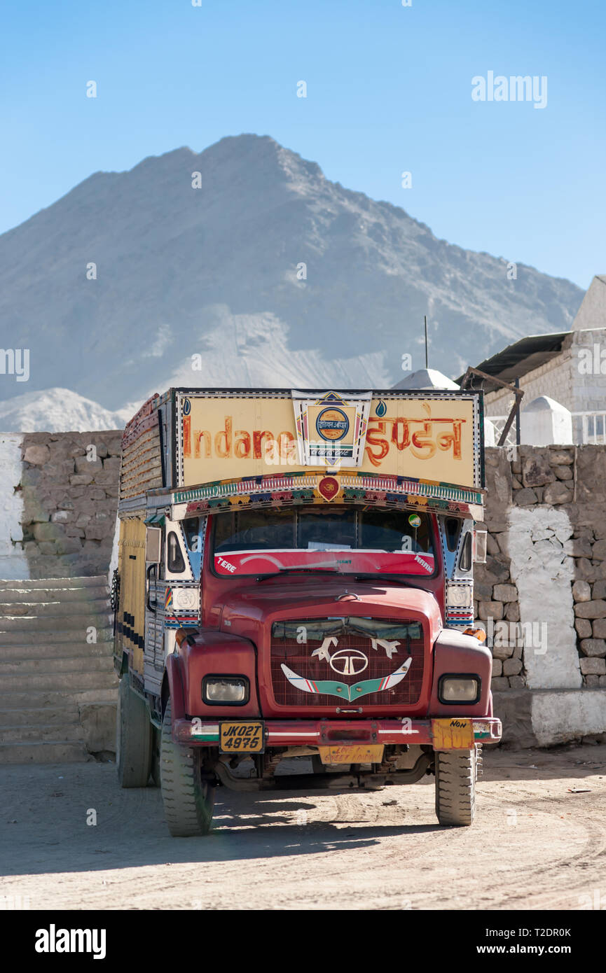 A decorated heavy goods vehicle in the Himalayan mountains of Northern India. Stock Photo