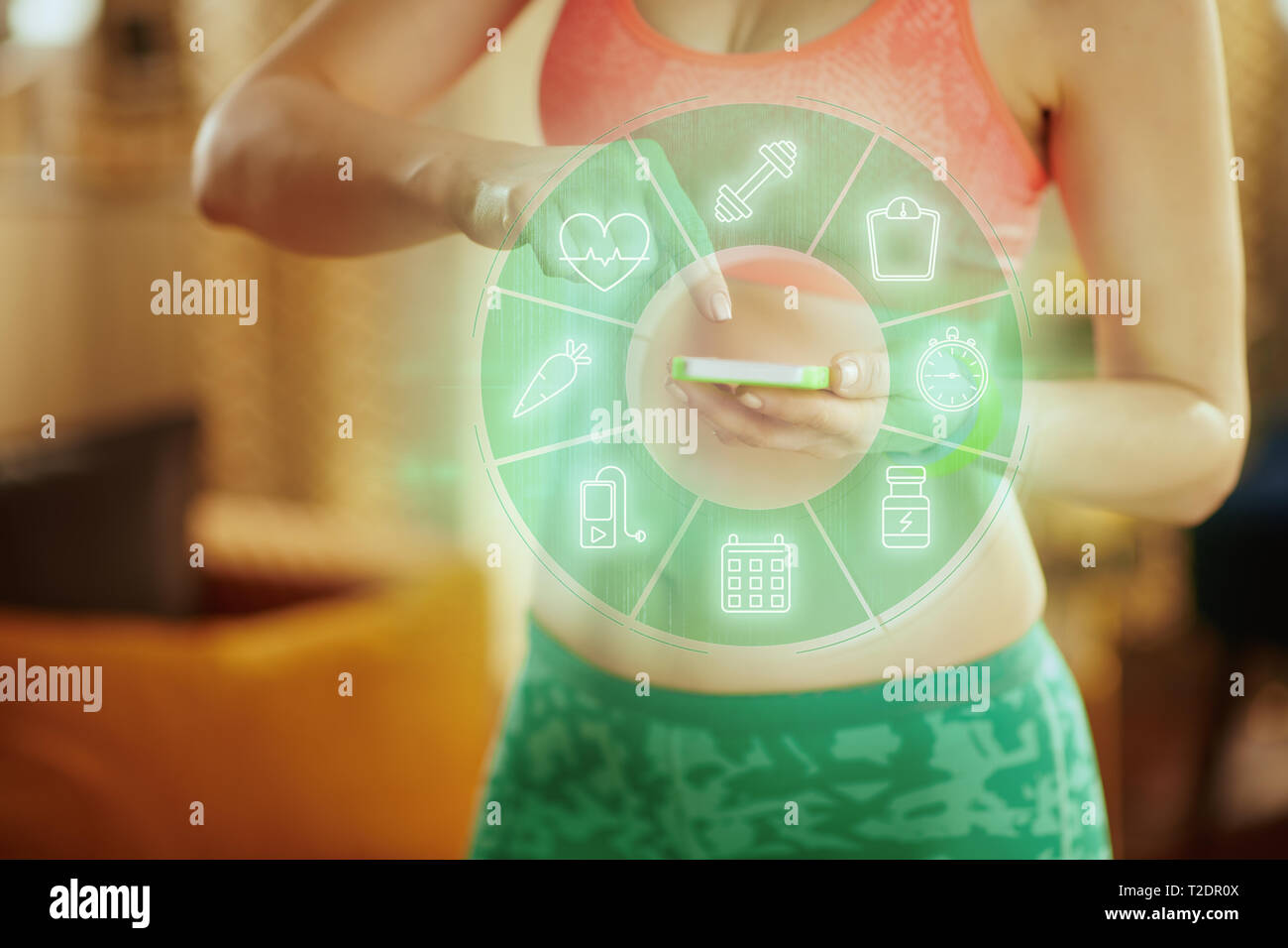 Closeup on smartphone in hand of fit woman using smartphone to track ...