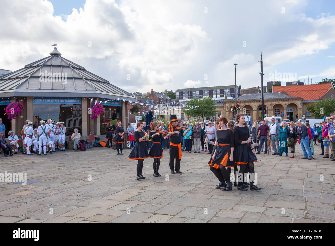 celebrations and dancing on the streets at Whitby Folk week 2018, North Yorkshire coast, England Stock Photo