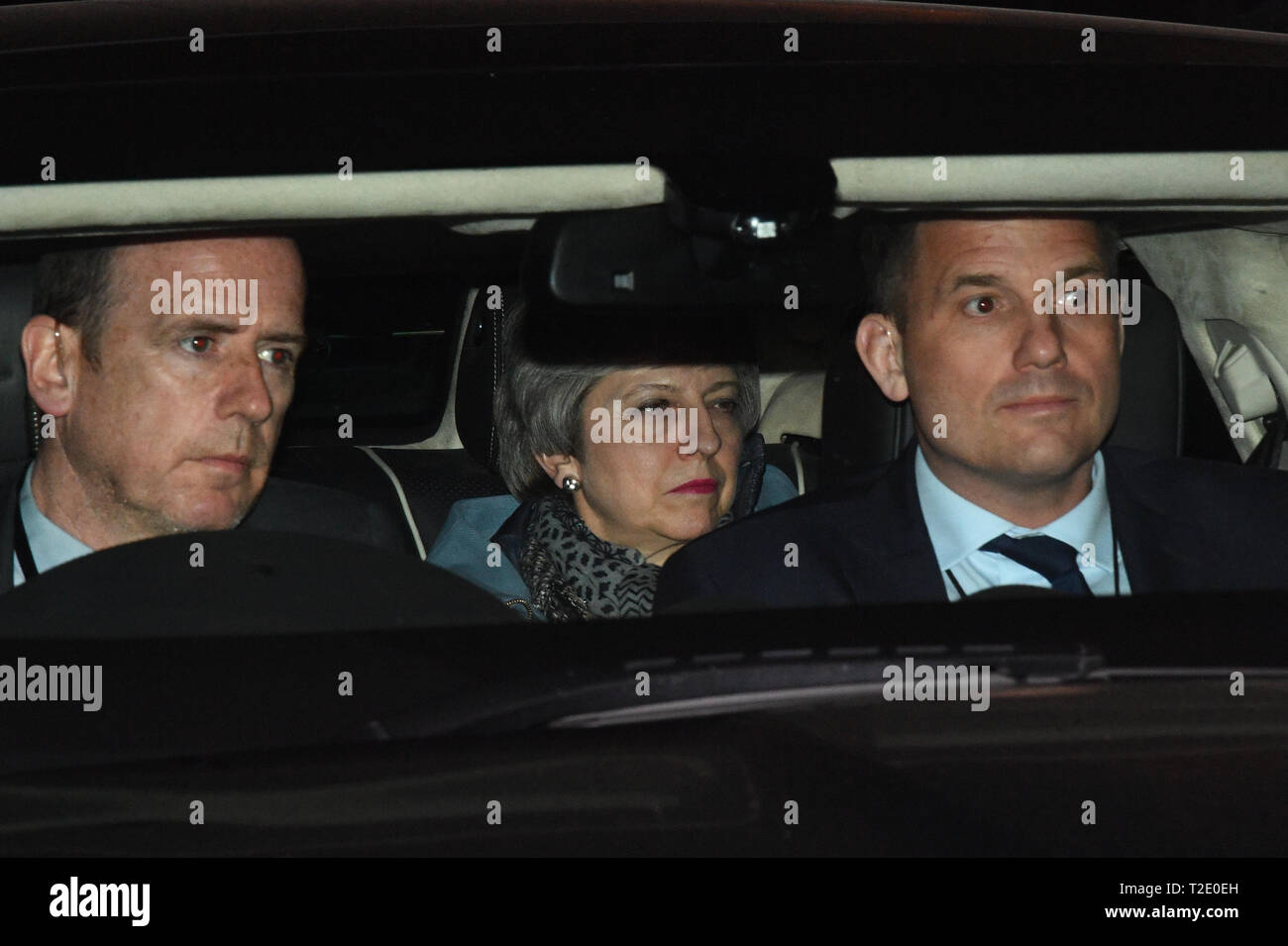 Prime Minister Theresa May leaving the House of Commons, London after MPs fail to back proposals on alternatives to her EU withdrawal deal. Stock Photo