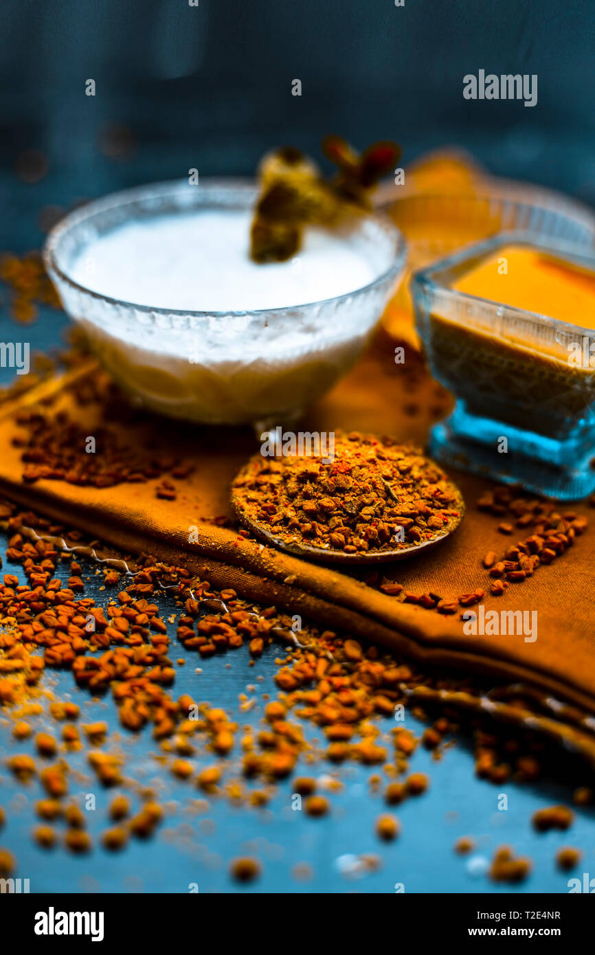 Herbal and organic home remedy for hair fall . Egg white mixed with curd  and fenugreek seeeds in a bowl,On wooden surface with raw fenugreek or met  Stock Photo - Alamy