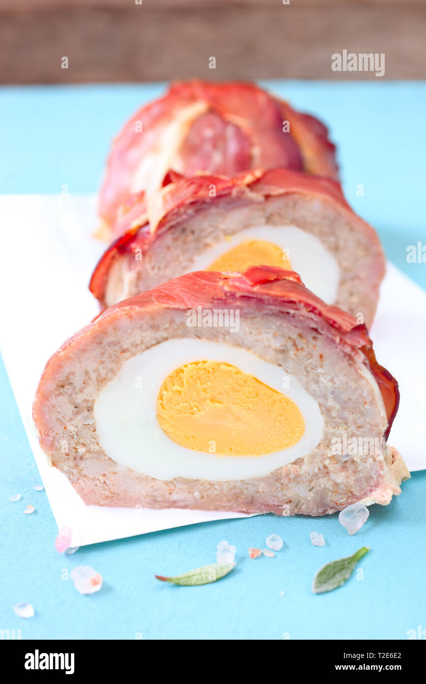 Scotch eggs wrapped in a bacon Stock Photo - Alamy