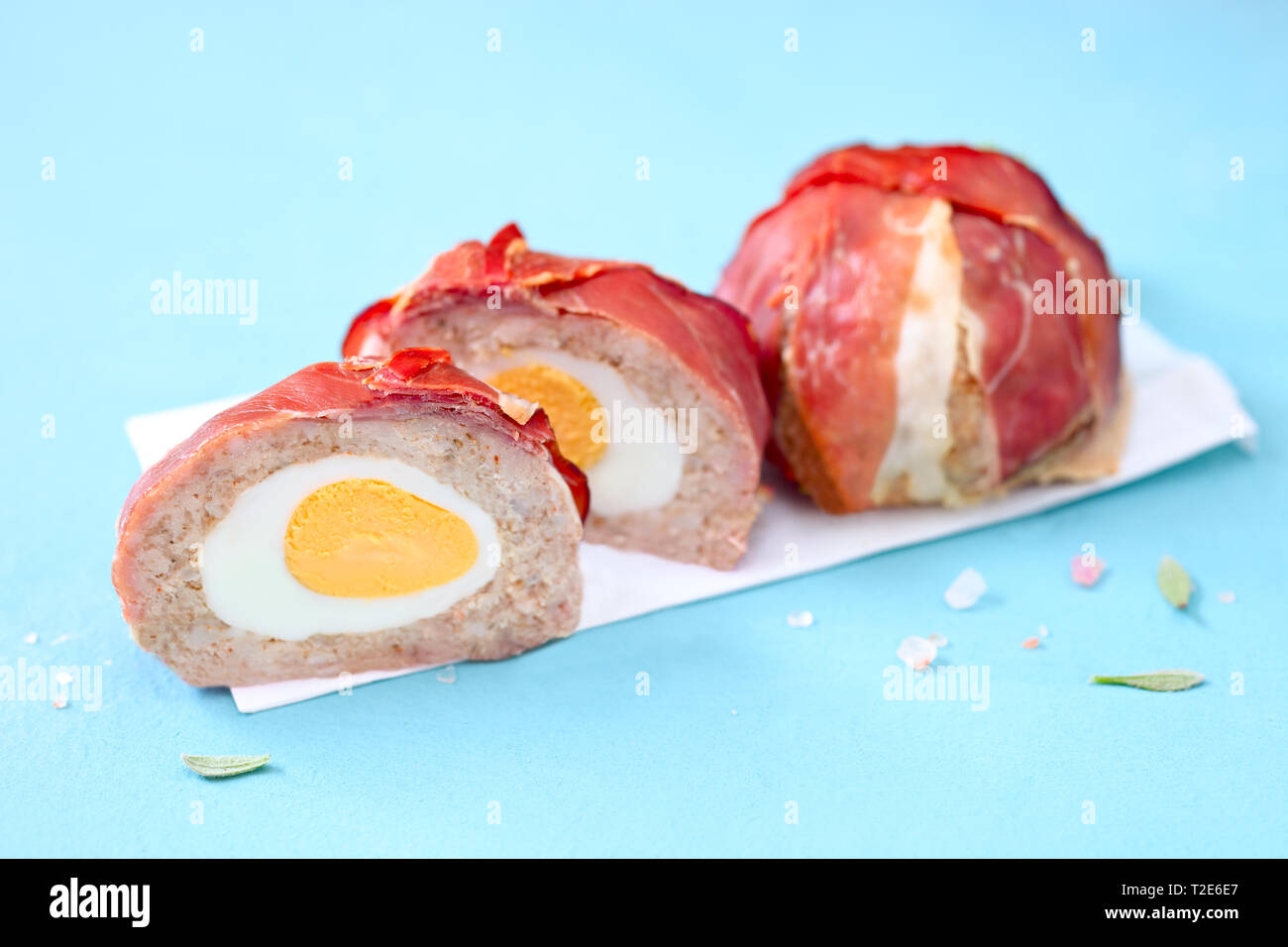 Scotch eggs wrapped in a bacon Stock Photo - Alamy