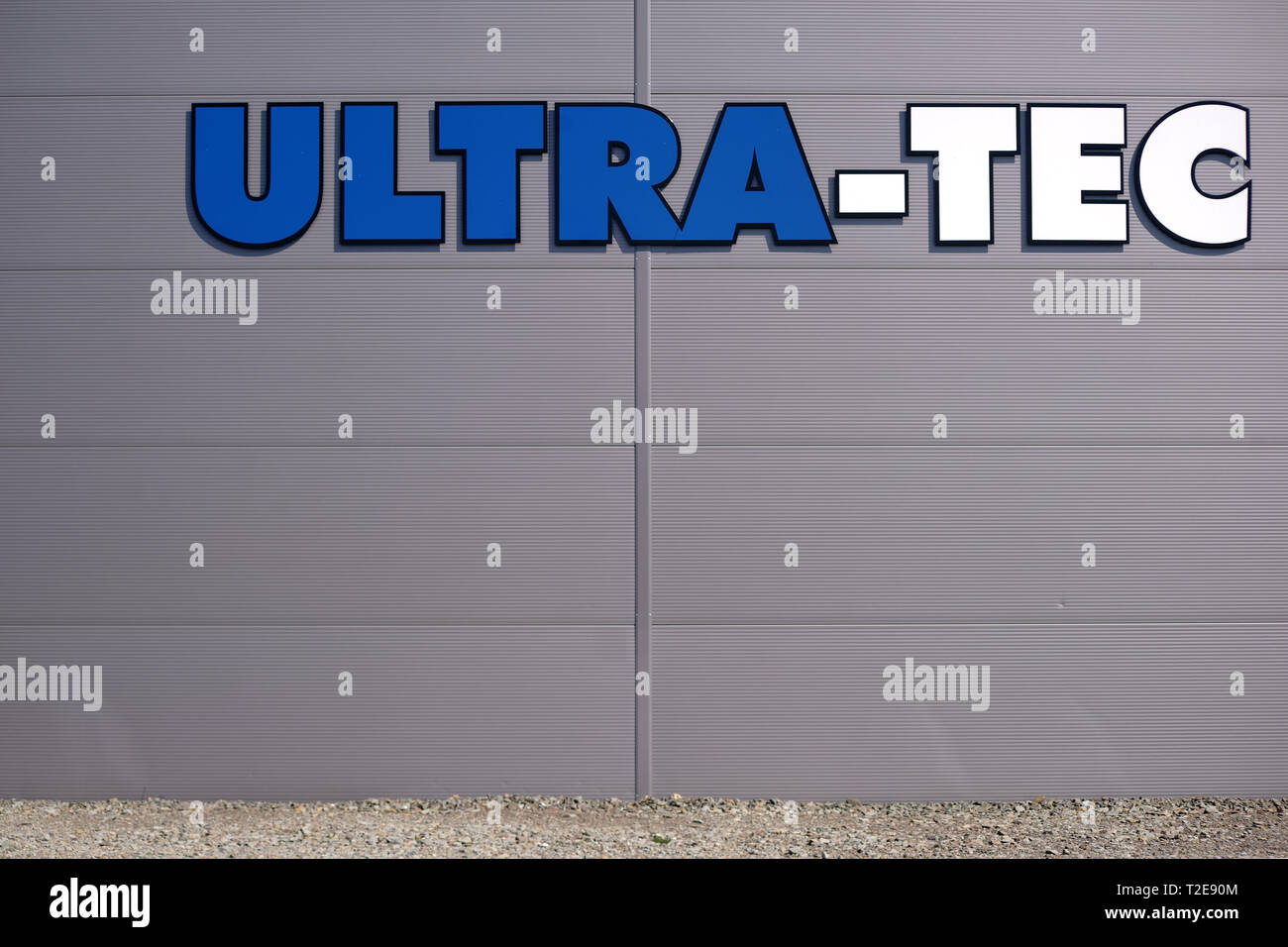 Pirmasens, Germany - March 30, 2019: The modern exterior facade of a business building or hall of the company Ultra-Tec with logo on March 30, 2019 in Stock Photo