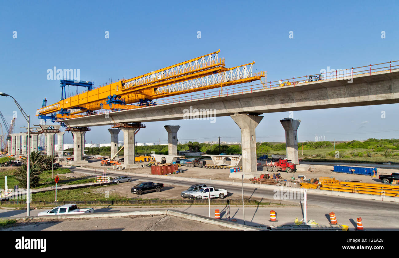 New Harbor Bridge construction, morning light. The harbor bridge crosses the Corpus Christi Ship Channel which serves the port of Corpus Christi. Stock Photo