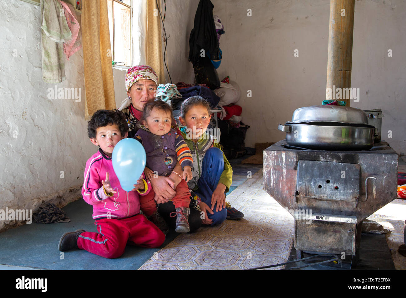 bayan Ulgii, Mongolia, 1st October 2015: mongolian nomad woman with her kids at her home Stock Photo