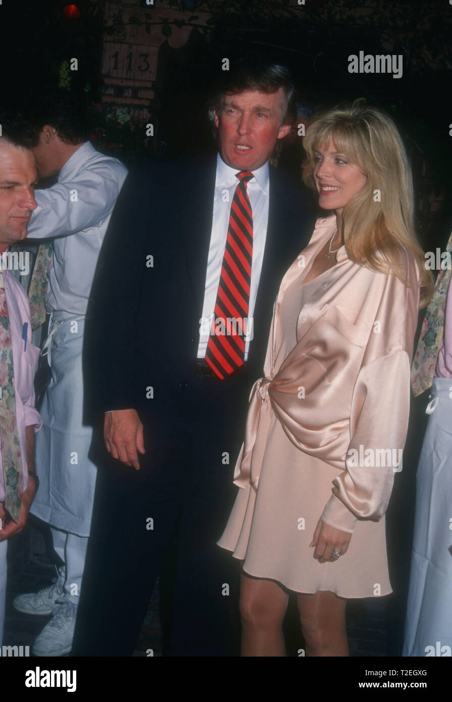 LOS ANGELES, CA - MARCH 12: Donald Trump and wife actress Marla Maples on March 12, 1994 at The Ivy Restaurant in Los Angeles, California. Photo by Barry King/Alamy Stock Photo Stock Photo