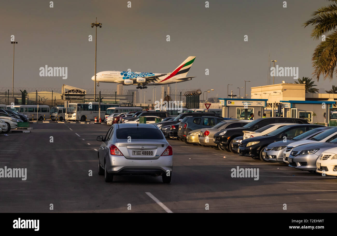 Emirates Airways; Airbus landing in Dubai international airport terminal 2 Stock Photo