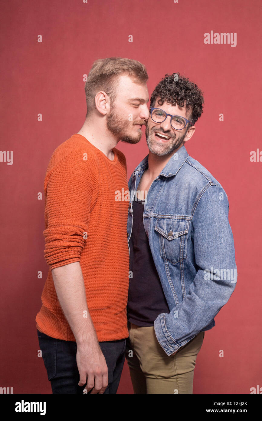 two men, smiling gay couple, acting cute and funny in front of camera Stock  Photo - Alamy