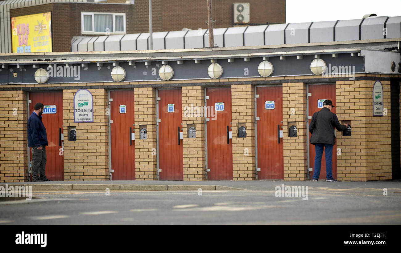 Row of public toilets and baby changing facilities Stock Photo Alamy