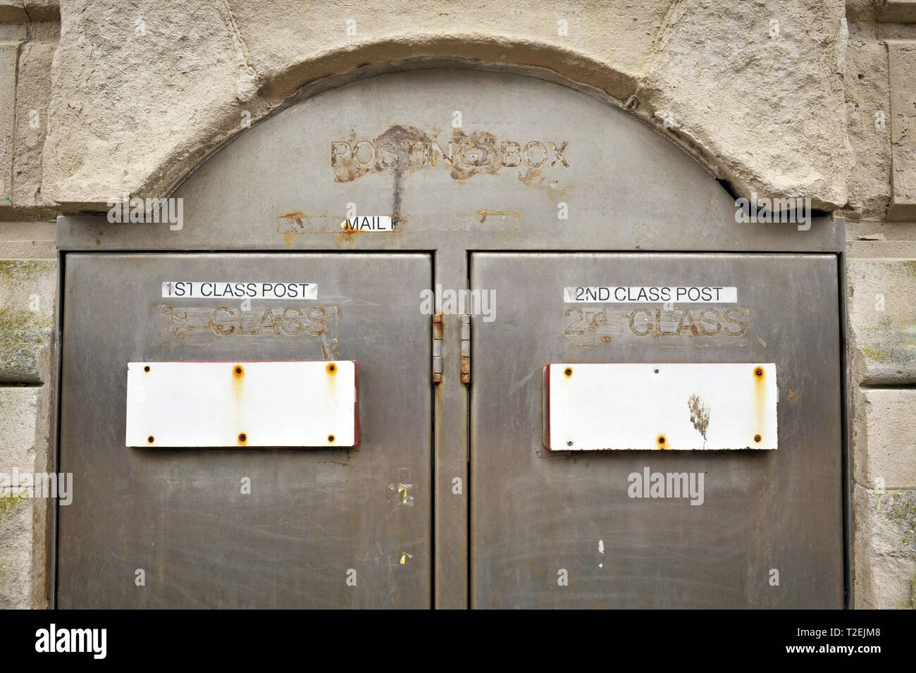 Sealed post boxes in the wall of redundant post office,UK Stock Photo