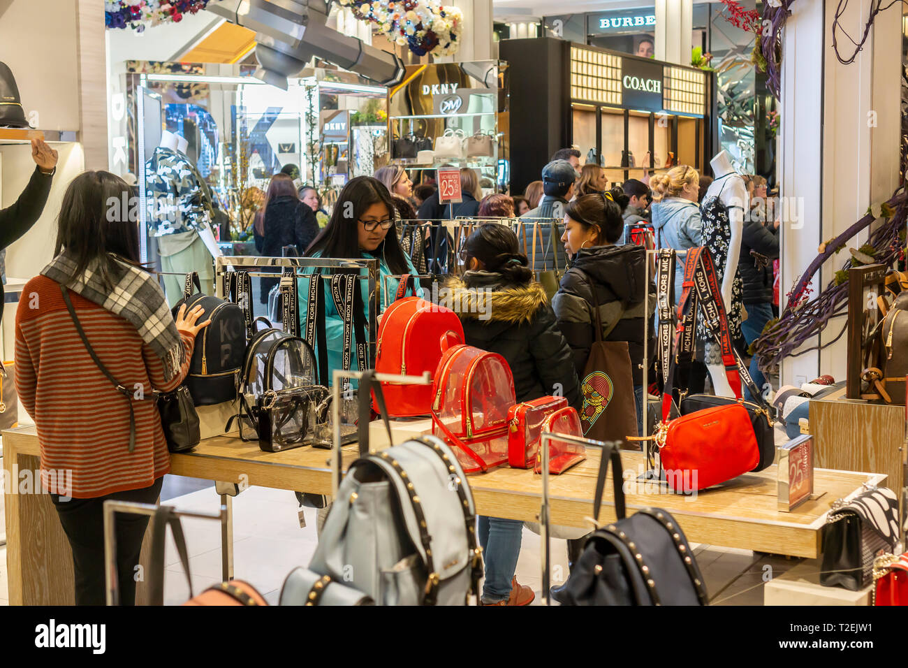 Handbags on display at the Michael Kors boutique within Macy's in New York  on Tuesday, August 4, 2015. First-quarter sales and profits for Michael  Kors handbag designer beat analysts' expectations, albeit low