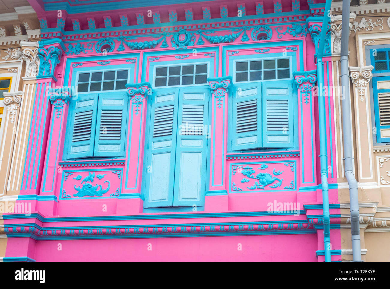 Louvre windows on Colourful Peranakan terraced houses popular with