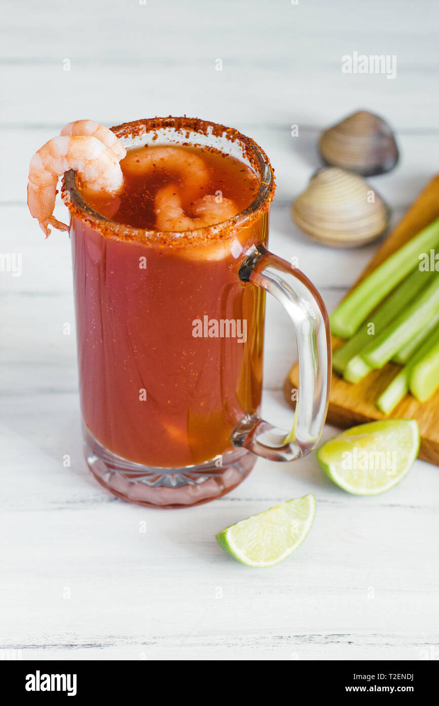 Michelada beer with tomato juice, clam and lemon, mexican drink cocktail in  mexico Stock Photo - Alamy