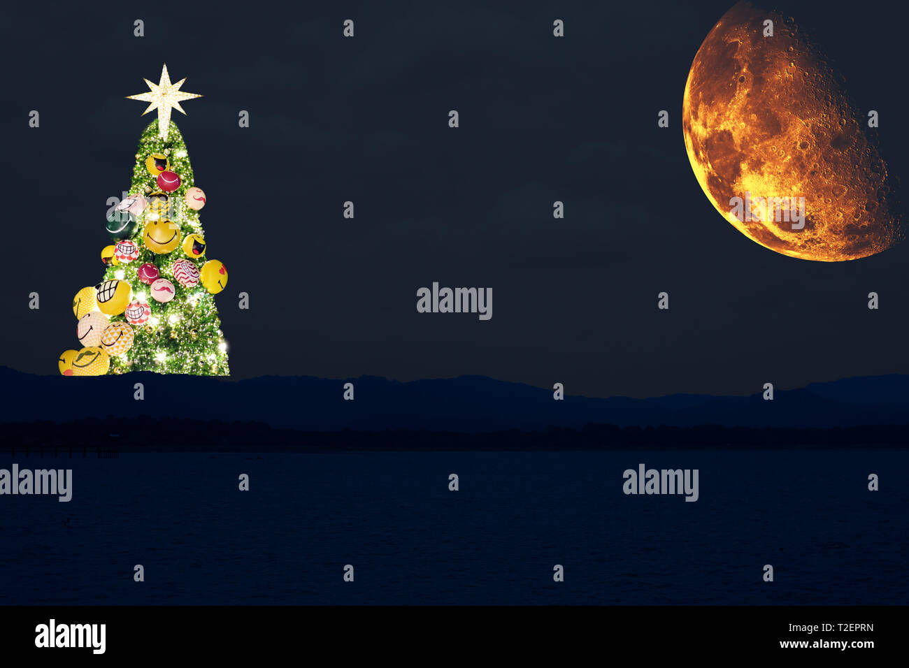 christmas tree and half blood moon back cloud over sea, Elements of this image furnished by NASA Stock Photo