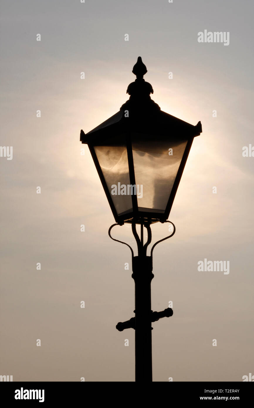 Old Street Lamp With Sun Behind Silhouette Stock Photo Alamy