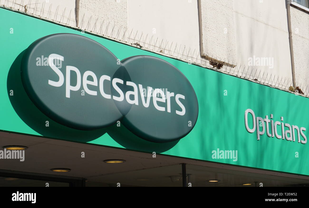 Specsaver signage above the entrance of the outlet in Broad Street, Reading, UK Stock Photo