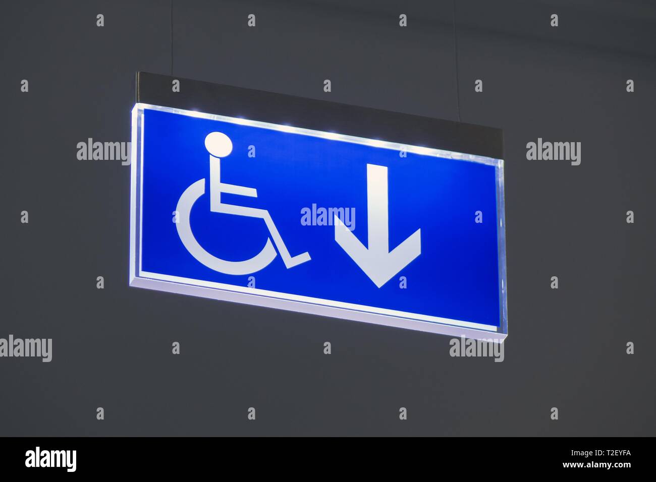 Blue wheelchair sign hi-res stock photography and images - Alamy