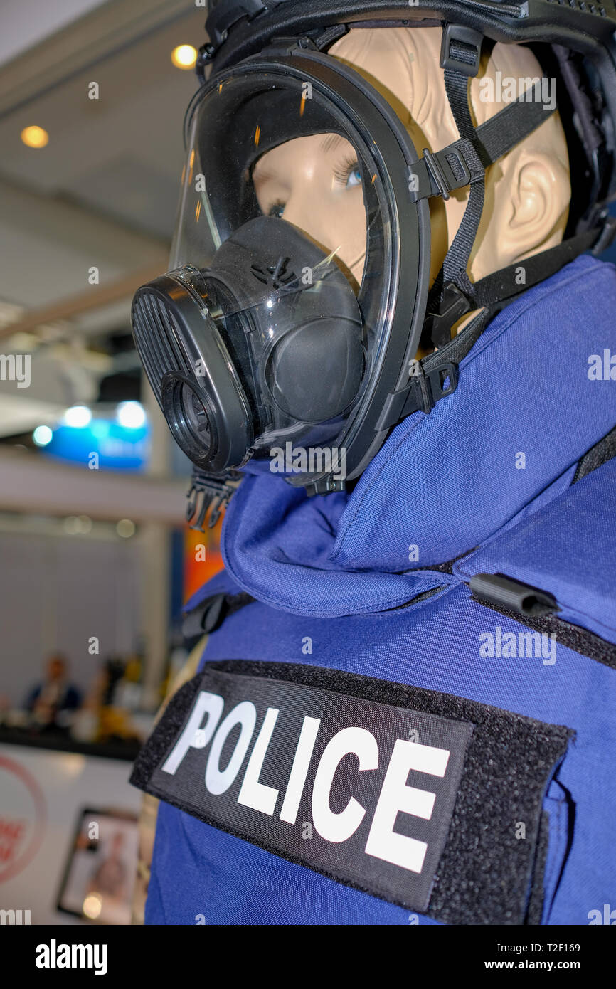 Mannequin in Police uniform and wearing safety mask Stock Photo