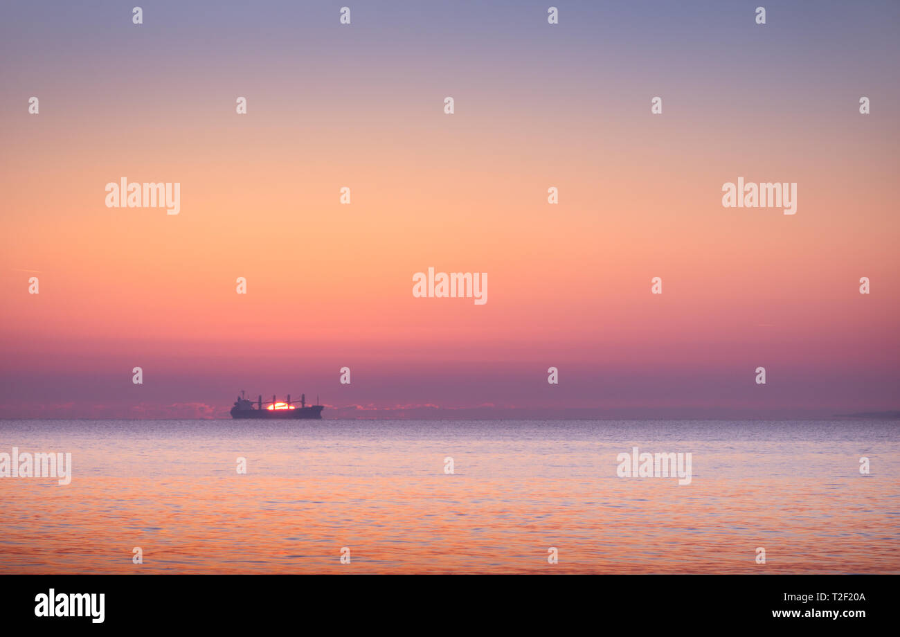 Silhouette of boat in sea hi-res stock photography and images - Alamy