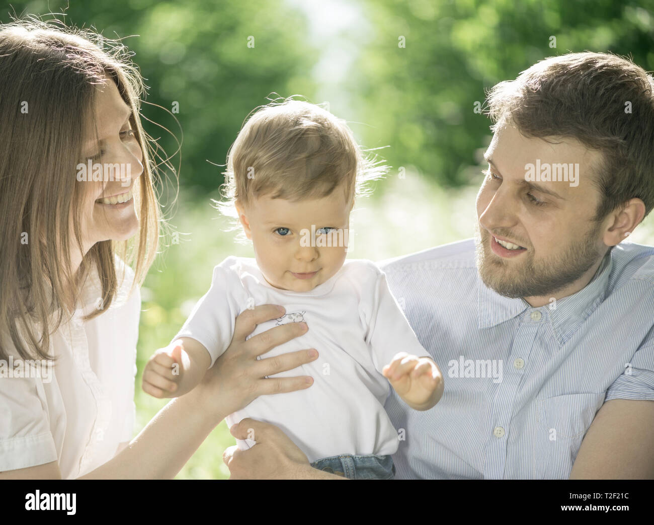 a happy family having fun outdoors Stock Photo