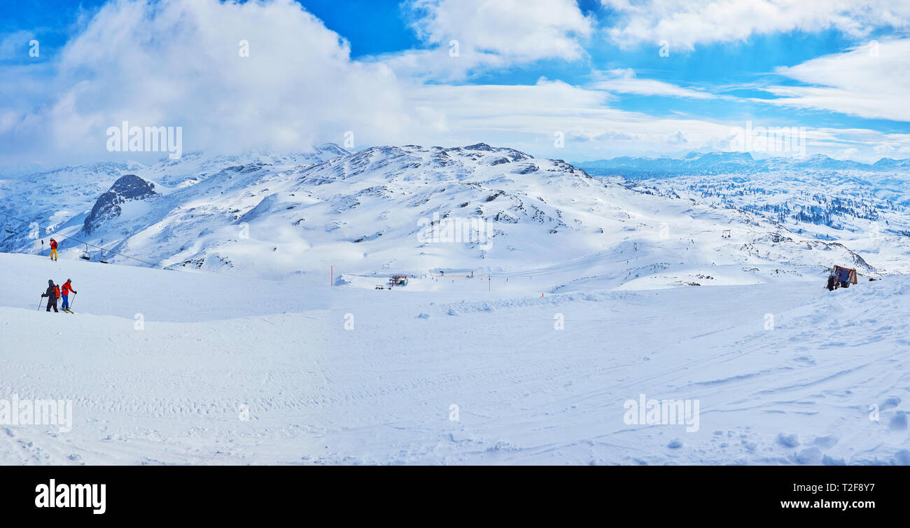 Panorama of Dachstein Alpine mountain range with the ski runs on the ...
