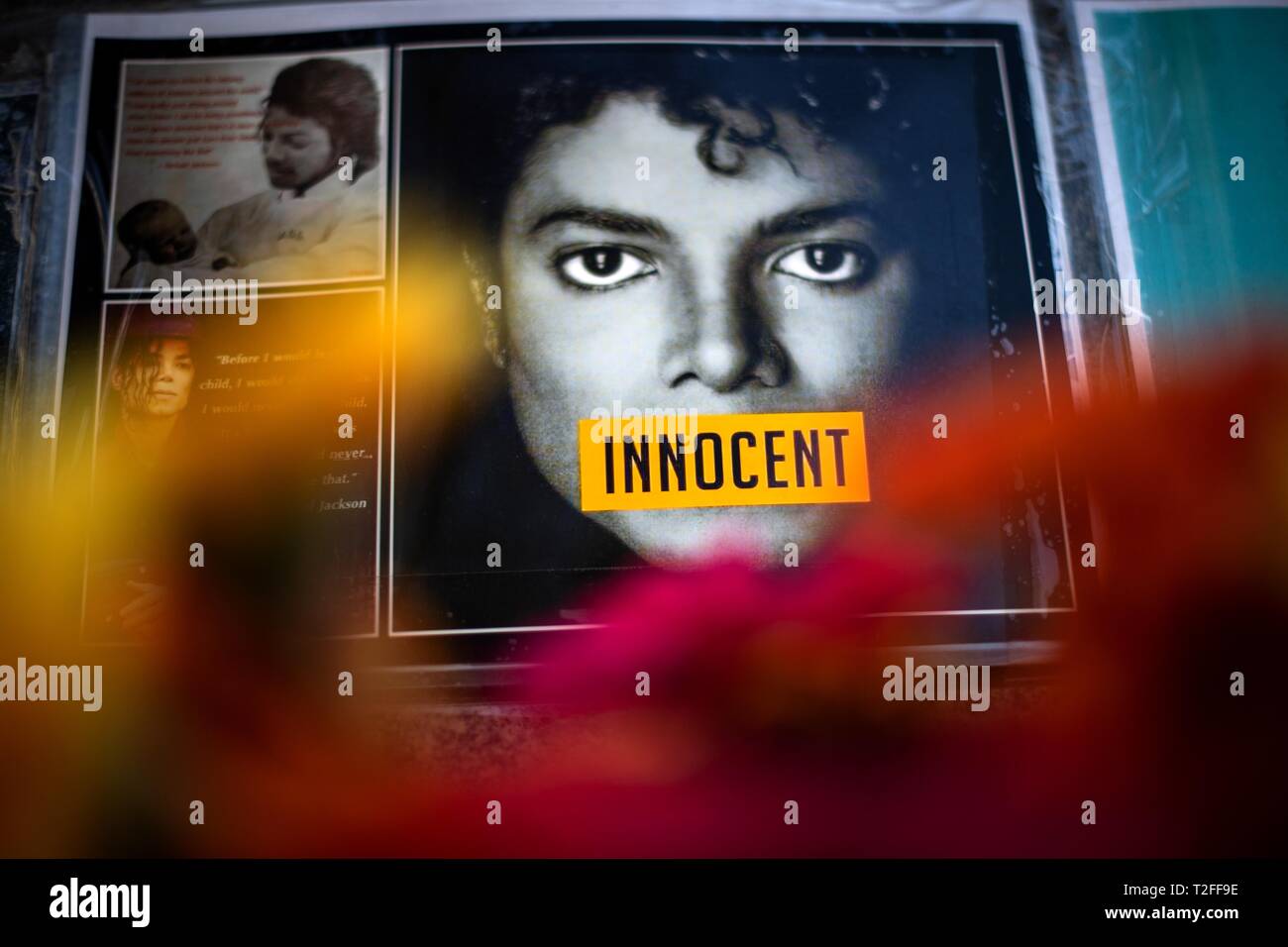 01 April 2019, Bavaria, München: 'Innocent' is written on a photo of Michael Jackson hanging on the monument to Jackson in front of the Bavarian Court. (to dpa: 'Brisante Michael Jackson documentary comes to Germany' from 02.04.2019) Photo: Sina Schuldt/dpa Stock Photo