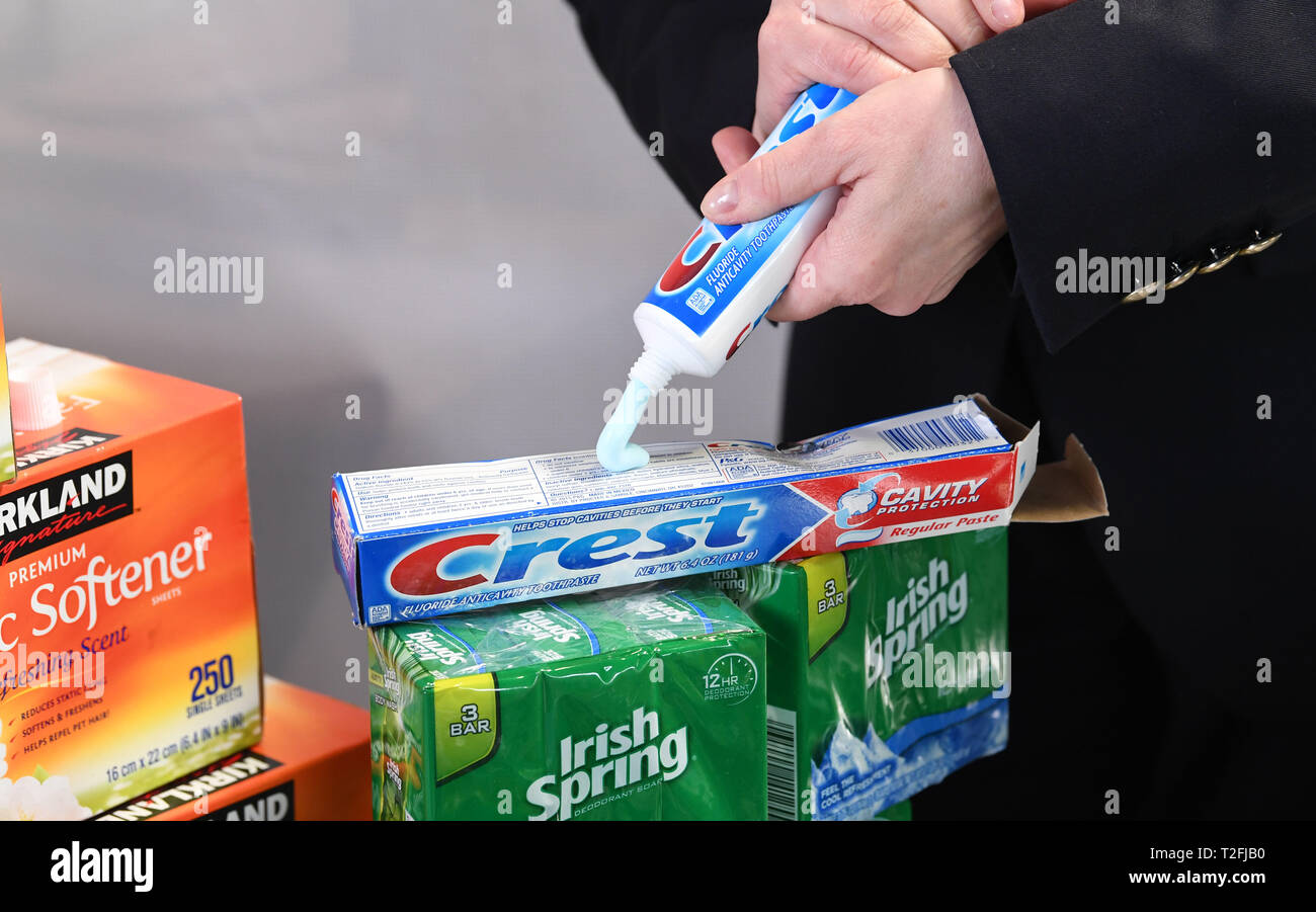 Bremerhaven, Germany. 02nd Apr, 2019. A customs officer presses a tube of toothpaste at a press conference of the main customs office in Bremen. The article was confiscated on import into Germany because it contained ingredients that are not allowed. The Pk reported among other things about customs duties, drug finds and illegal employment in 2018. Credit: Carmen Jaspersen/dpa/Alamy Live News Stock Photo