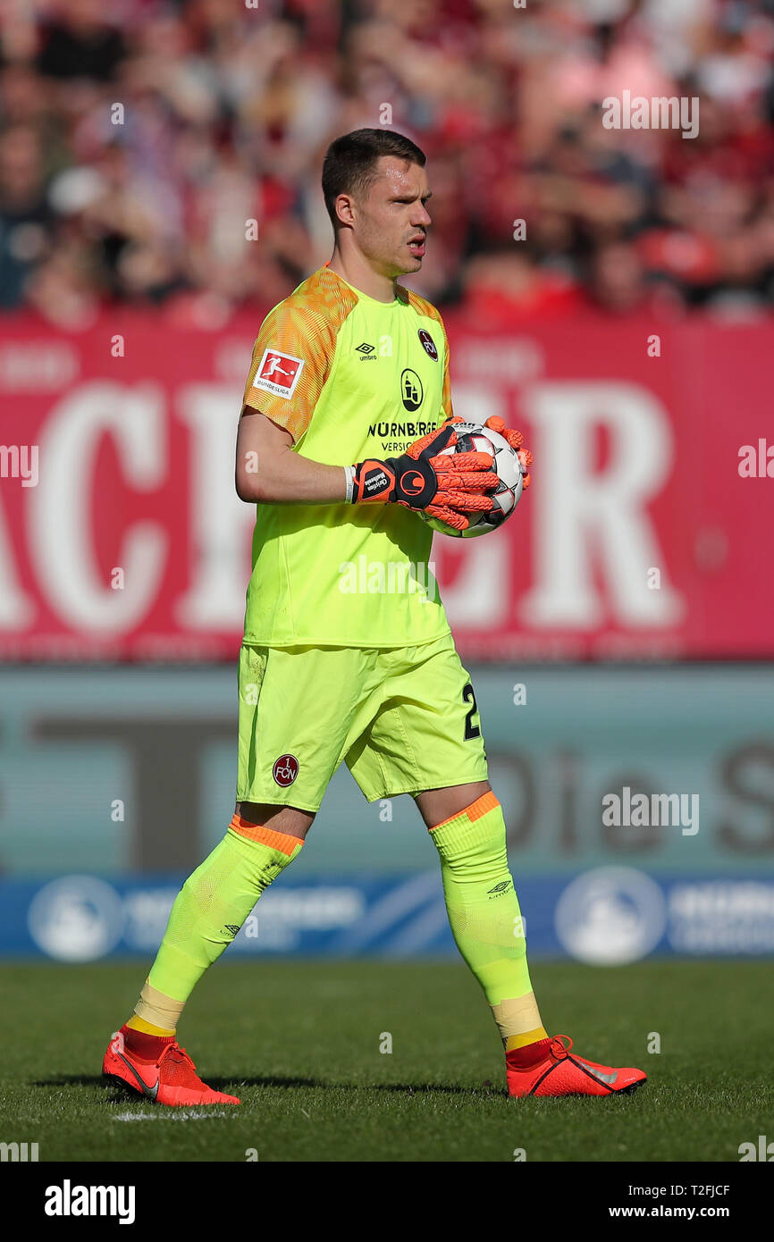 30 March 2019, Bavaria, Nürnberg: Soccer: Bundesliga, 1st FC Nuremberg - FC Augsburg, 27th matchday in Max Morlock Stadium. Nuremberg goalkeeper Christian Mathenia. Photo: Daniel Karmann/dpa - IMPORTANT NOTE: In accordance with the requirements of the DFL Deutsche Fußball Liga or the DFB Deutscher Fußball-Bund, it is prohibited to use or have used photographs taken in the stadium and/or the match in the form of sequence images and/or video-like photo sequences. Stock Photo