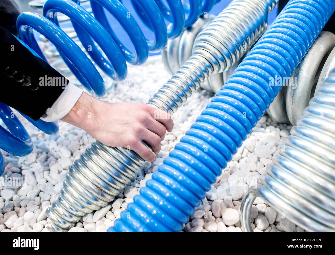 Hannover, Germany. 02nd Apr, 2019. Compression and tension springs for vehicles and industrial plants are on display at Platzmann's stand at the Hanover Fair. From 1 to 5 April, everything at Hannover Messe will revolve around networking, learning machines and the Internet of Things. Credit: Hauke-Christian Dittrich/dpa/Alamy Live News Stock Photo