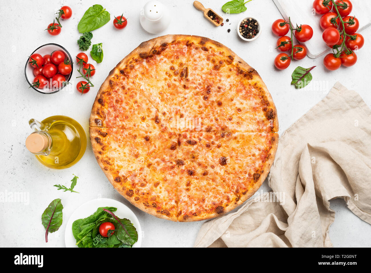 Tasty cheese pizza on white background top view, flat lay composition. Copy space for text Stock Photo
