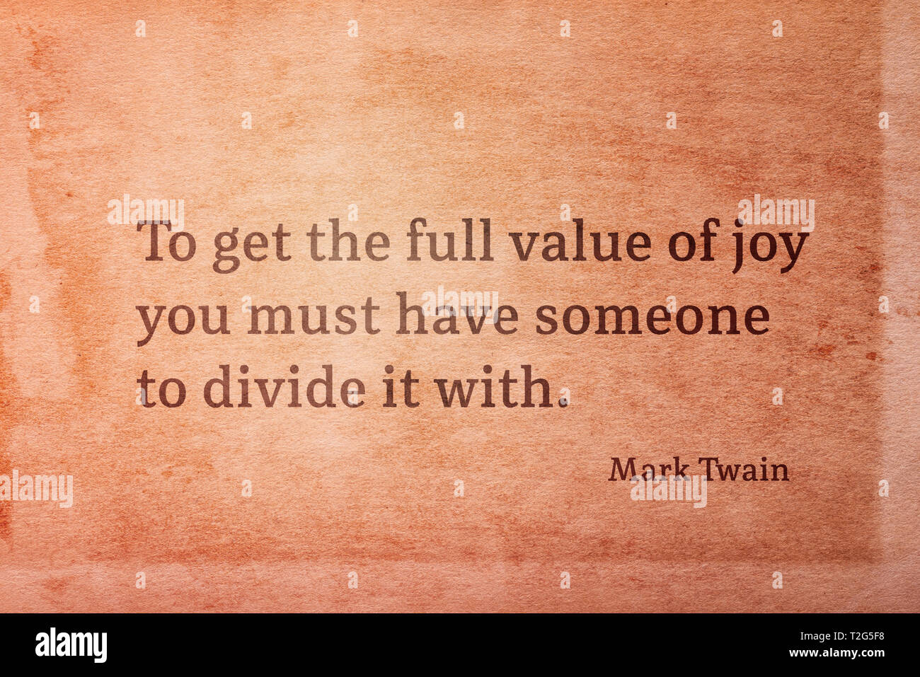To get the full value of joy you must have someone to divide it with - famous American writer Mark Twain quote printed on vintage grunge paper Stock Photo