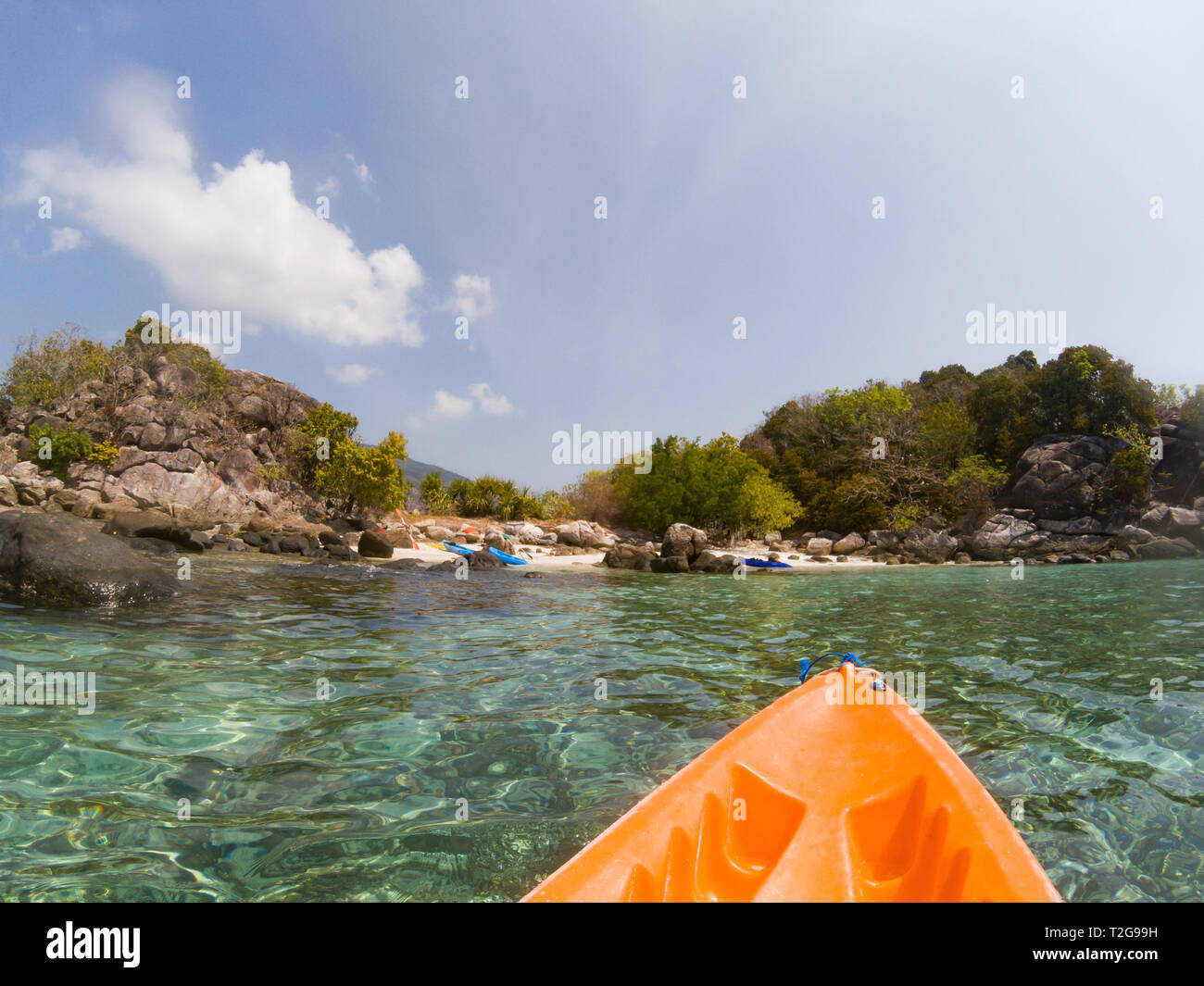 kayaking in crystal clear tropical waters kayak heading to isolated