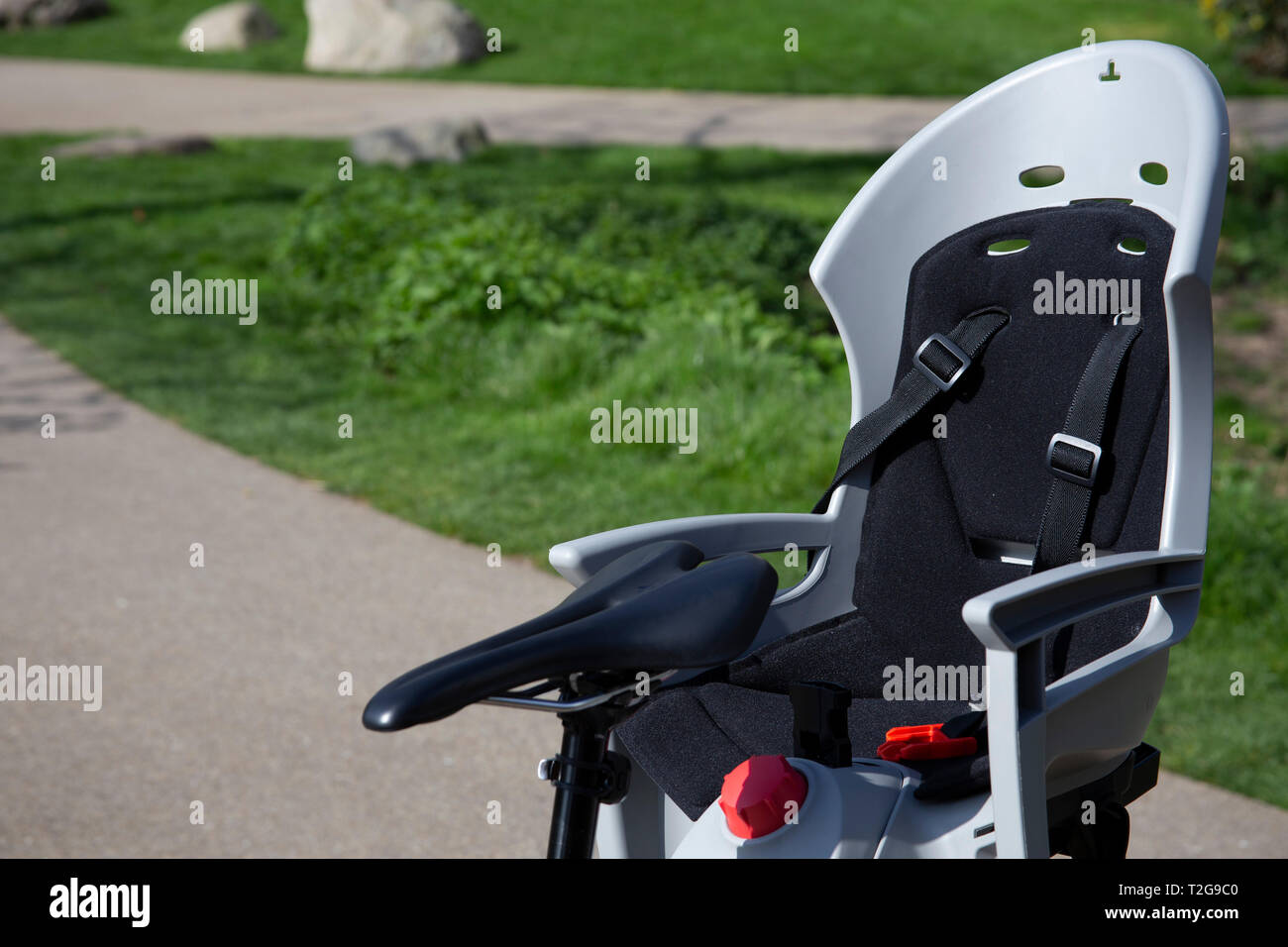 child seat on the back of a bike Stock Photo Alamy
