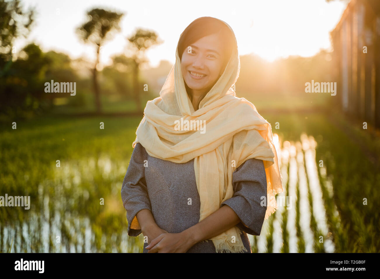attractive young asian woman wearing hijab in sunset outdoor Stock ...