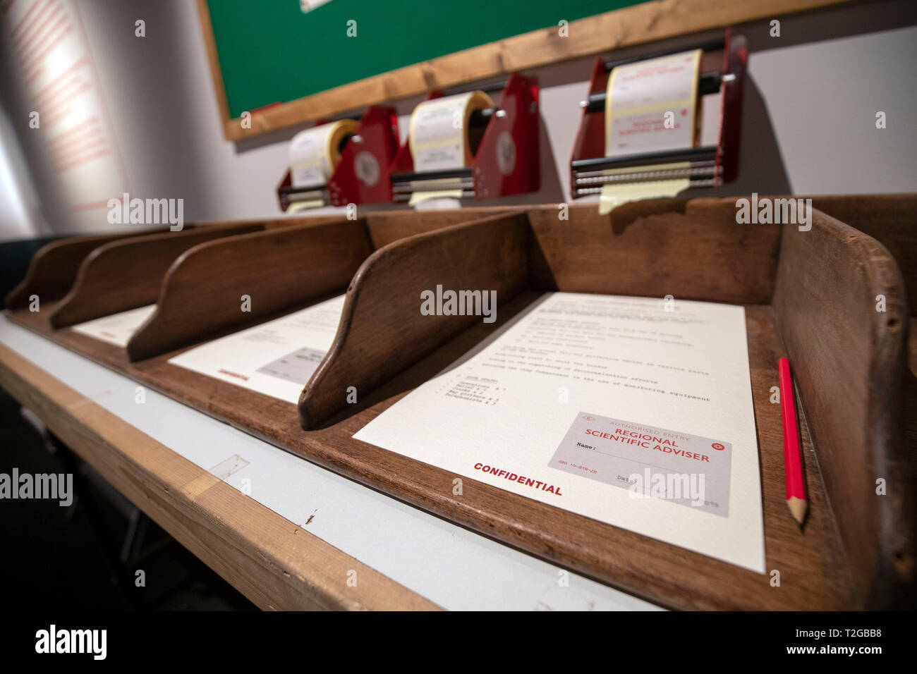 A general view of the sign in sheets in the recreation of a Government bunker during the preview of the National Archives new exhibition, Protect and Survive: Britain's Cold War Revealed, at the National Archives, Richmond. Stock Photo
