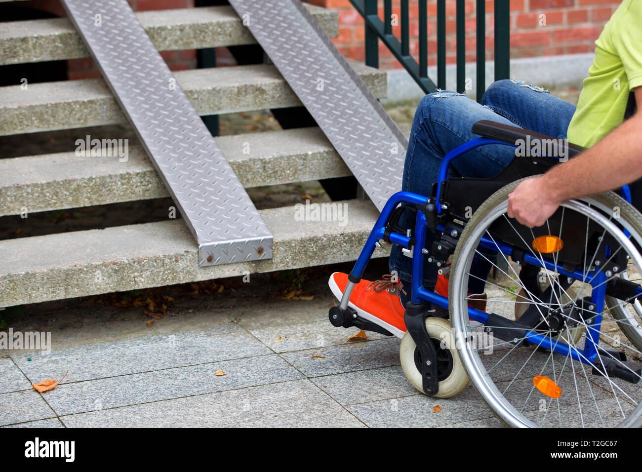 Young disabled man wheelchair ramp hi-res stock photography and images ...