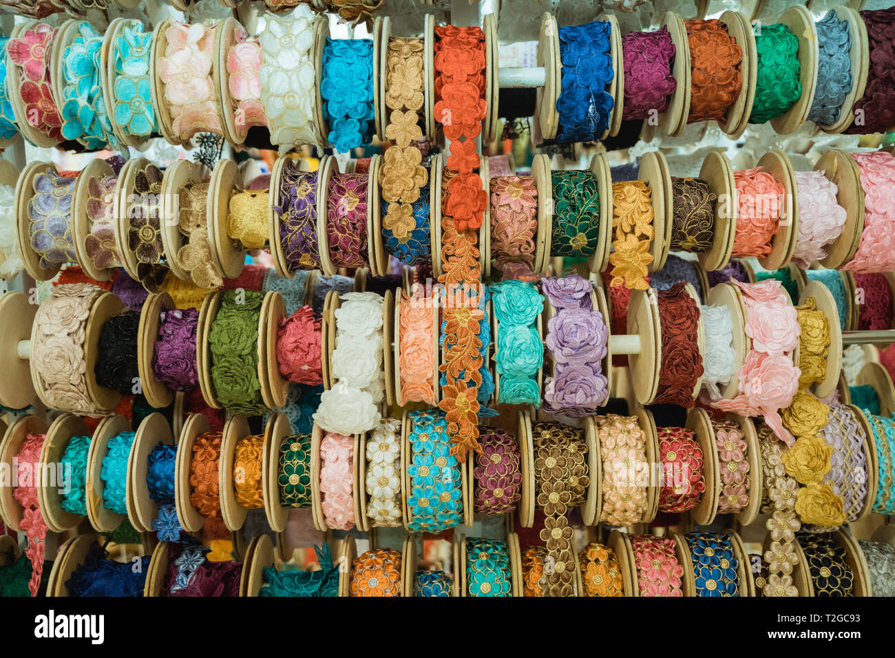 background of fabric decoration garments in the shop Stock Photo - Alamy