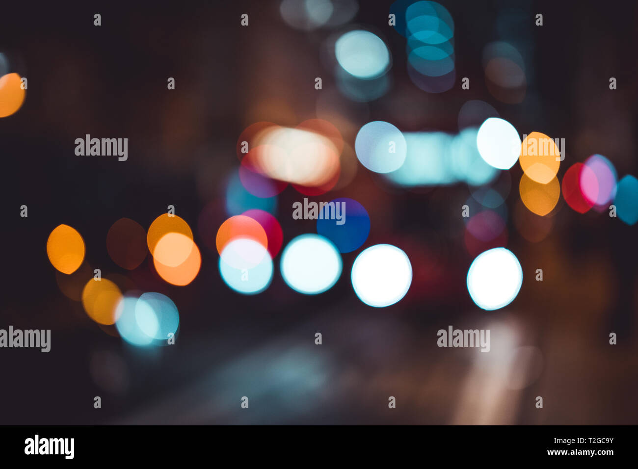 Abstract bokeh lights in city blurred night background Stock Photo - Alamy