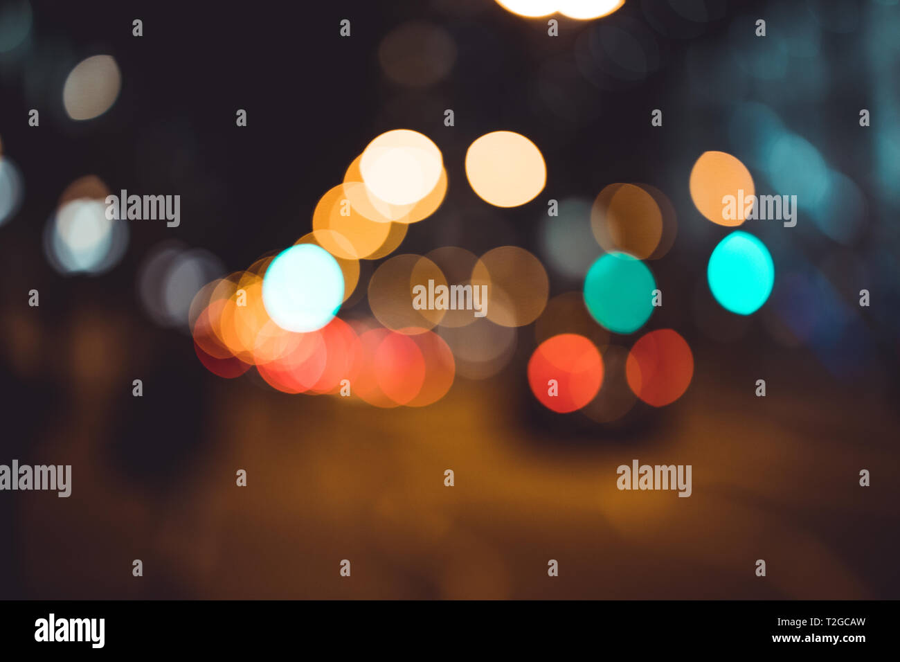 Abstract bokeh lights in city blurred night background Stock Photo - Alamy